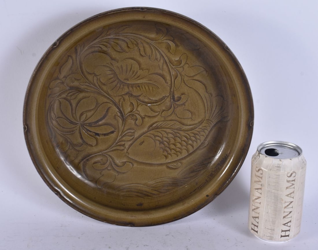 A CHINESE CELADON INCISED SCALLOPED FISH BOWL. 27 cm wide.: A CHINESE CELADON INCISED SCALLOPED FISH BOWL. 27 cm wide.