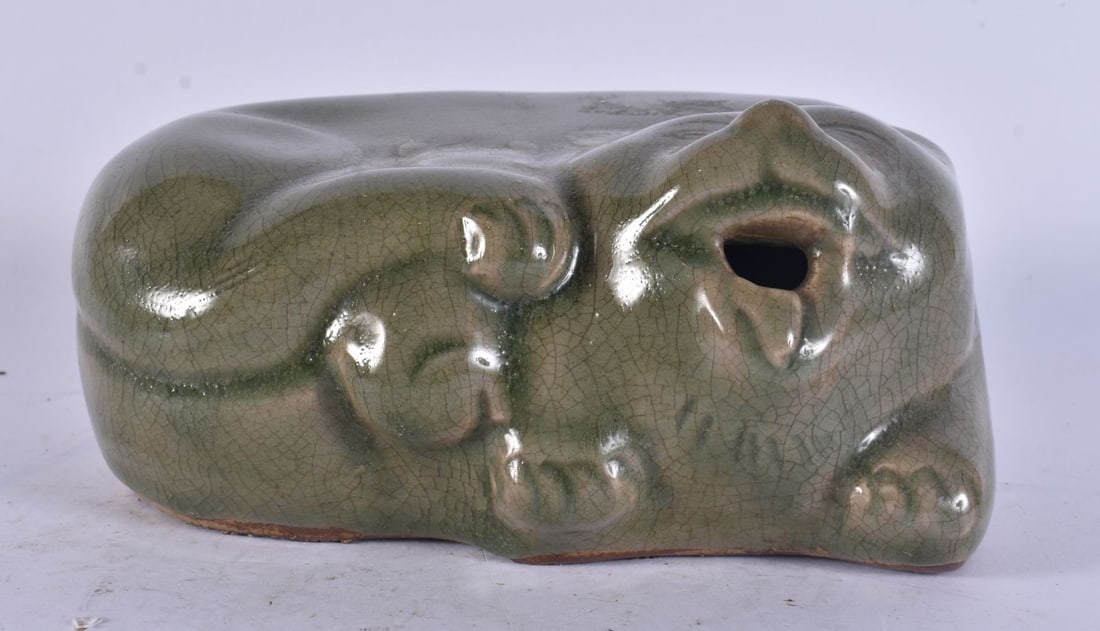 AN UNUSUAL CHINESE CELADON FIGURE OF A CAT. 18 cm x 11 cm.: AN UNUSUAL CHINESE CELADON FIGURE OF A CAT. 18 cm x 11 cm.