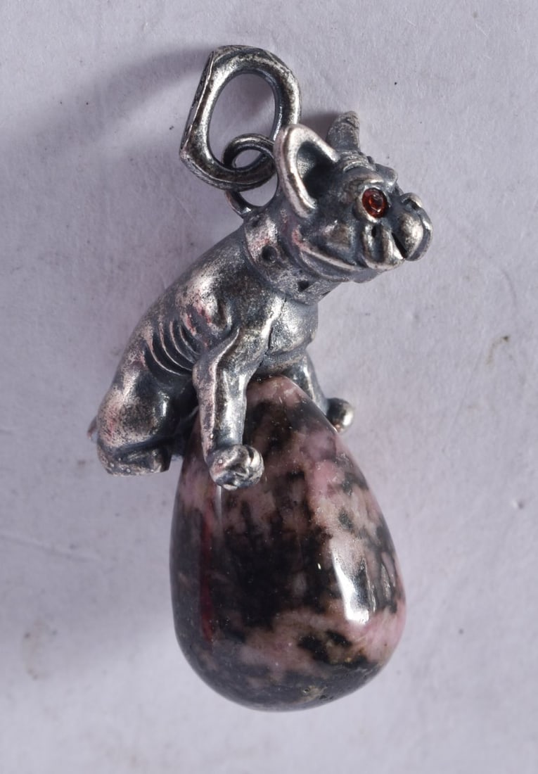 A Rhodonite Pendant with a Continental Silver Dog Mount. Stamped 84. 3cm x 1.7cm x 1.3cm, weight 11g (1 of 3)