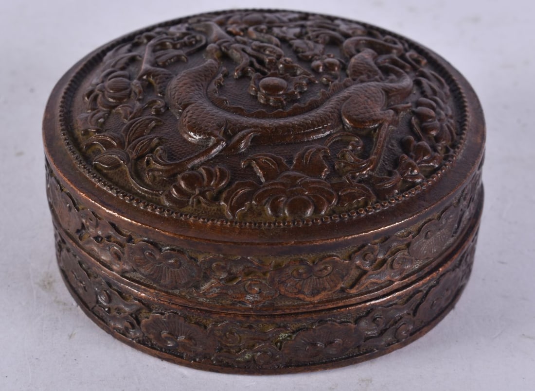 A Bronze Box with Raised Dragon Decoration on Lid. 8.3cm x 3.6cm, weight 322g: A Bronze Box with Raised Dragon Decoration on Lid. 8.3cm x 3.6cm, weight 322g