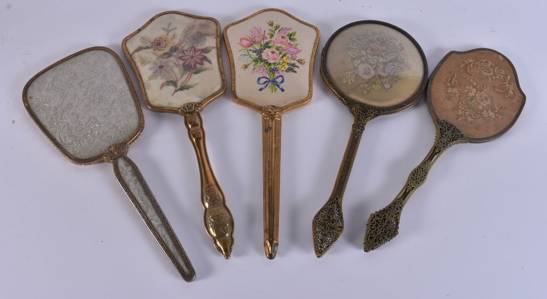 FIVE VINTAGE GILT METAL VANITY MIRRORS. 34 cm long. (5) (1 of 4)