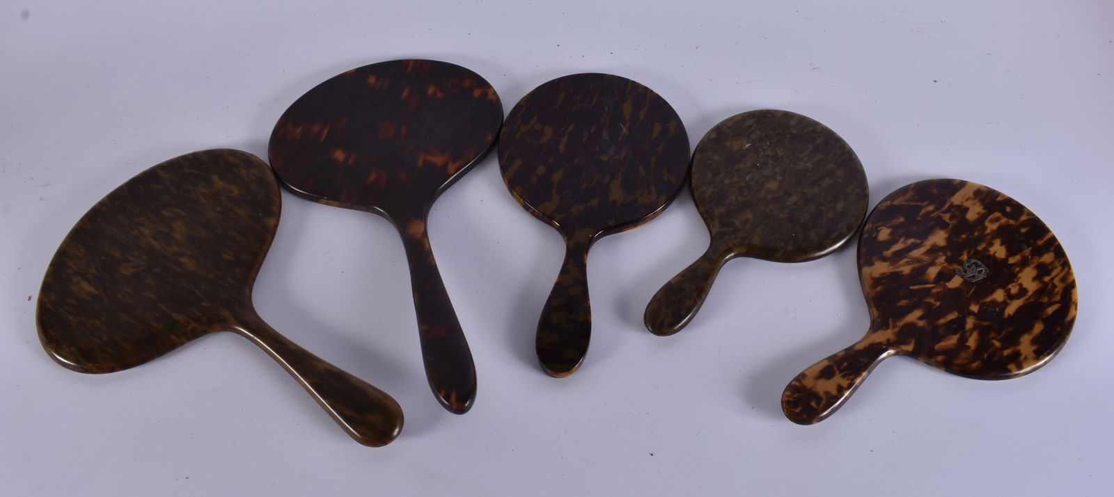 FIVE VINTAGE FAUX TORTOISESHELL VANITY MIRRORS. 34 cm long. (5) (1 of 4)