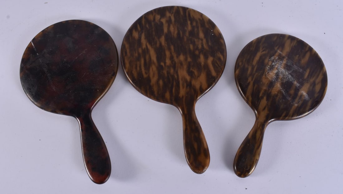 THREE VINTAGE FAUX TORTOISESHELL VANITY MIRRORS. 34 cm long. (3) (1 of 5)