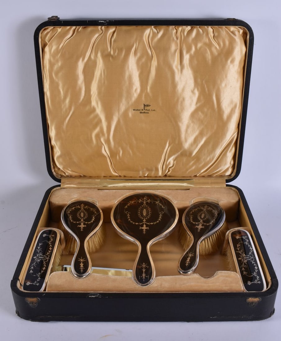 AN ANTIQUE SILVER AND TORTOISESHELL DRESSING TABLE SET. 750 grams overall. Box 42 cm x 32 cm. (1 of 5)