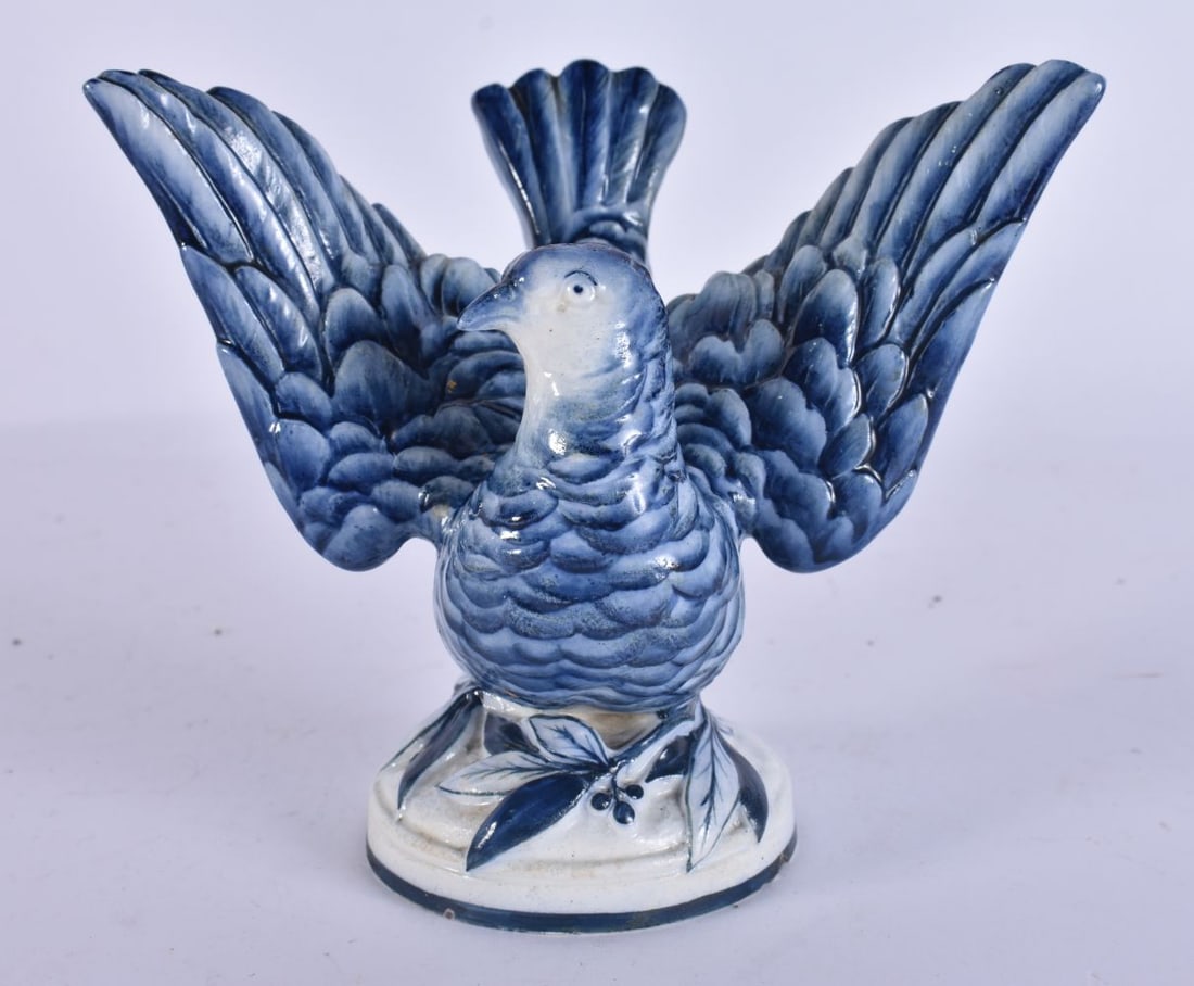 AN EXTREMELY RARE 19TH CENTURY WEDGWOOD BLUE AND WHITE BIRD modelled upon a base smothered in leaves (1 of 7)
