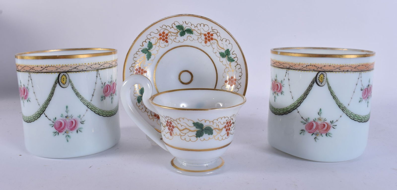 AN UNUSUAL VICTORIAN OPALINE GLASS CUP AND SAUCER together with a pair of similar vases. Largest 10. (1 of 7)