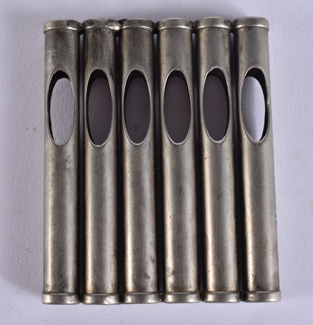 AN UNUSUAL MILITARY TRENCH ART CIGARETTE HOLDER. 6.5 cm x 8 cm. (1 of 5)