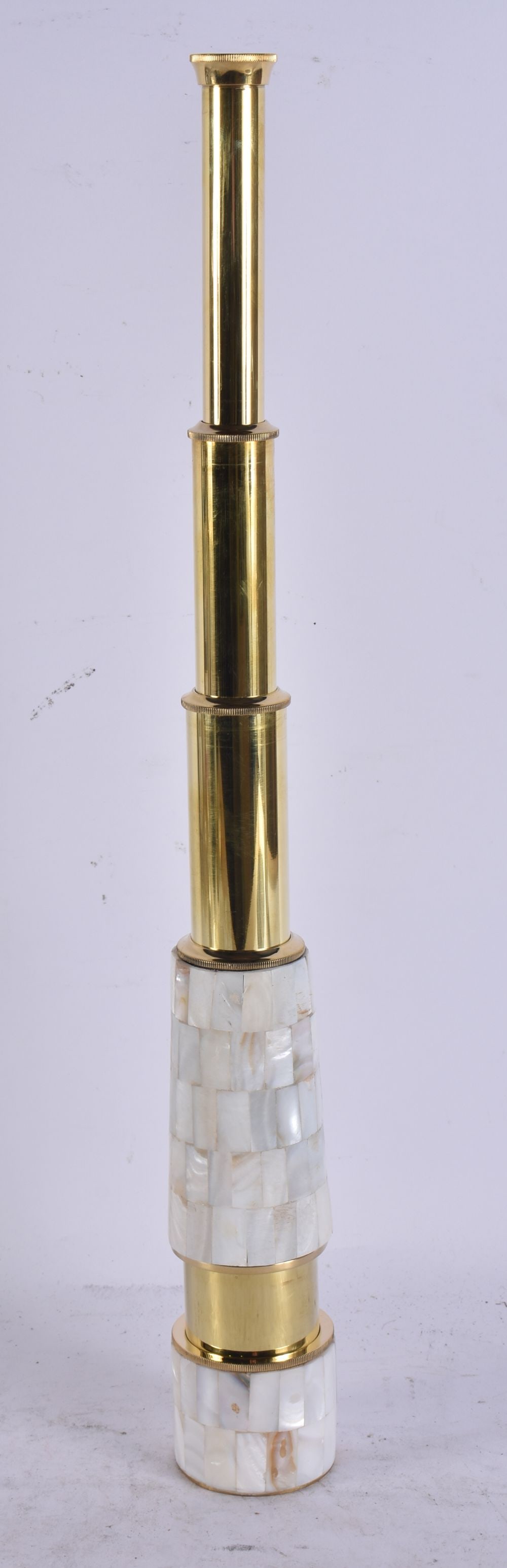 A MOTHER OF PEARL EXTENDING TELESCOPE. 42 cm high extended. (1 of 3)