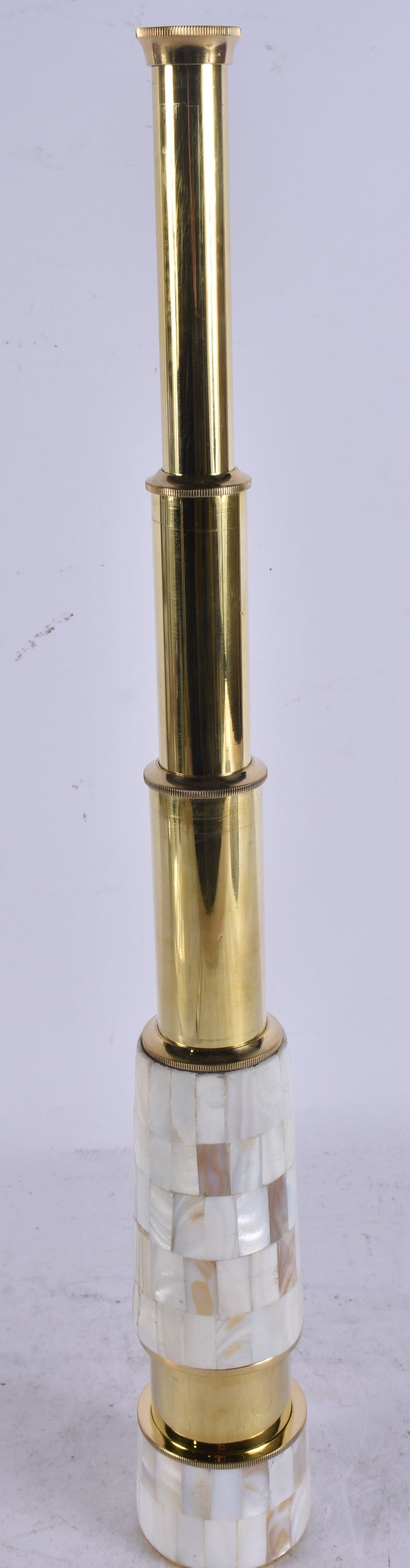 A MOTHER OF PEARL EXTENDING TELESCOPE. 42 cm high extended. (1 of 3)