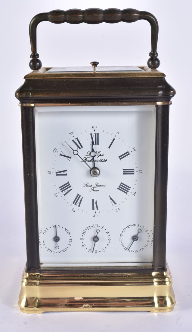 A L 'EPEE REPEATING BRASS CARRIAGE CLOCK with three subsidiary dials. 17.5 cm high inc handle. (1 of 7)