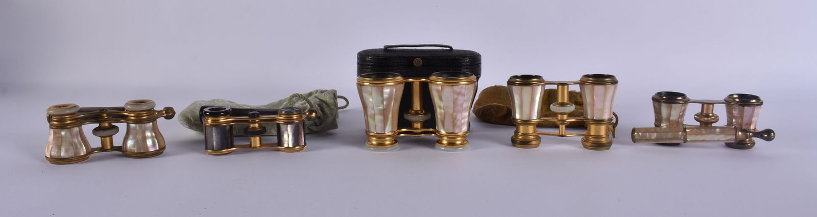 FIVE PAIRS OF MOTHER OF PEARL OPERA GLASSES. (5): FIVE PAIRS OF MOTHER OF PEARL OPERA GLASSES. (5)