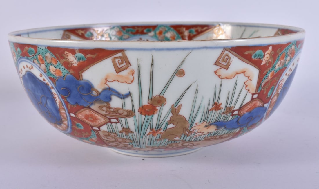 A 19TH CENTURY JAPANESE MEIJI PERIOD IMARI PORCELAIN BOWL painted with animals and foliage. 22 cm wi (1 of 5)