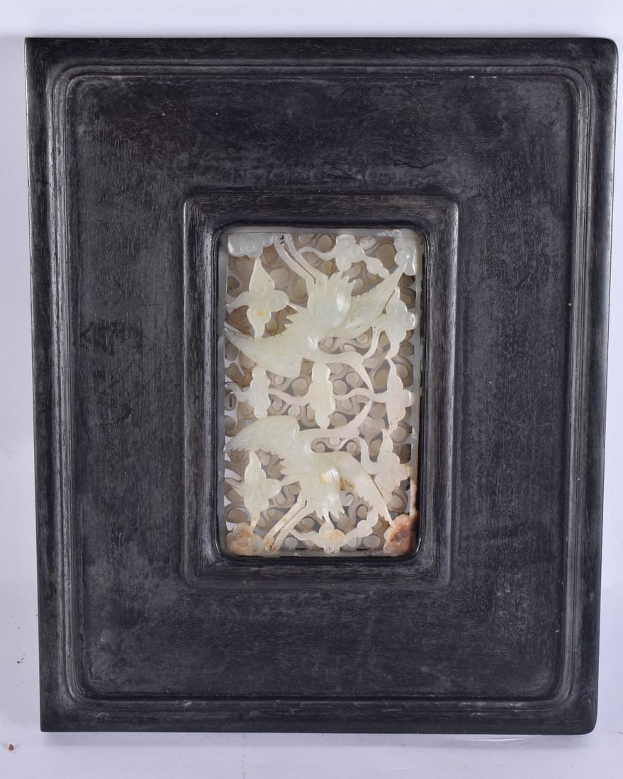 A CHINESE CARVED ZITAN AND RETICULATED JADE PANEL depicting birds in flight. 22.5 cm x 18.5 cm, jade (1 of 5)