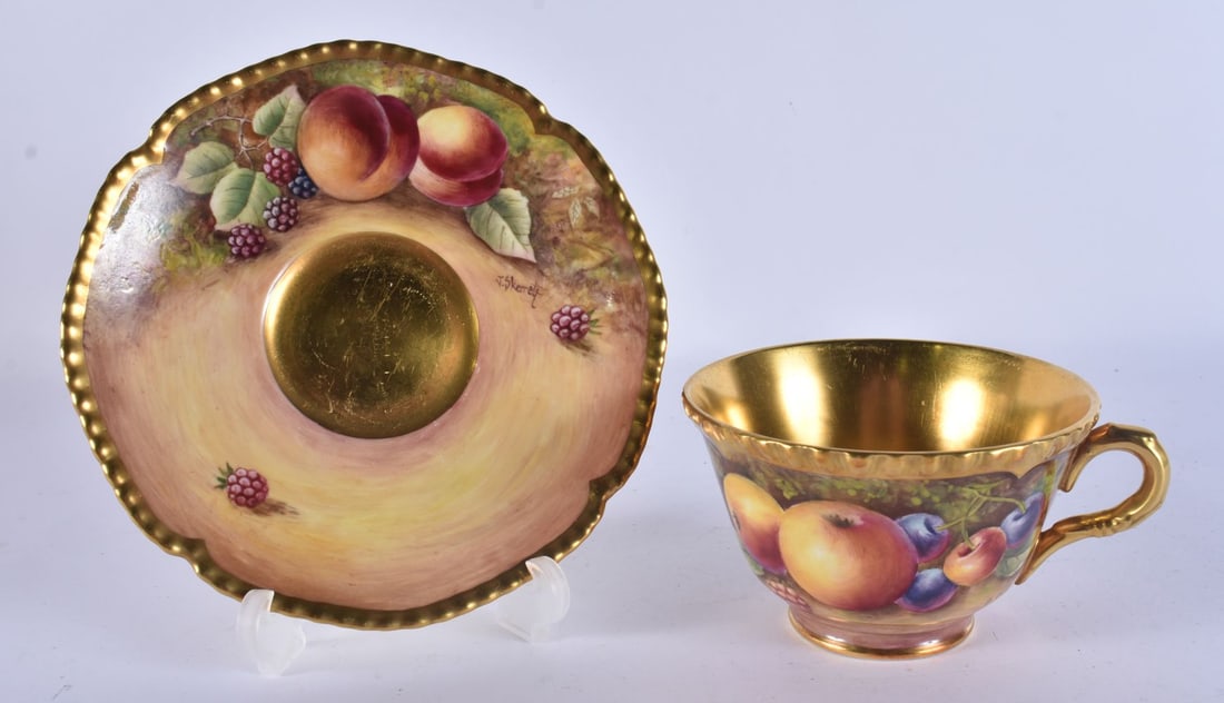 A ROYAL WORCESTER FRUIT PAINTED CUP AND SAUCER by Cox & Skerett. (2) (1 of 10)