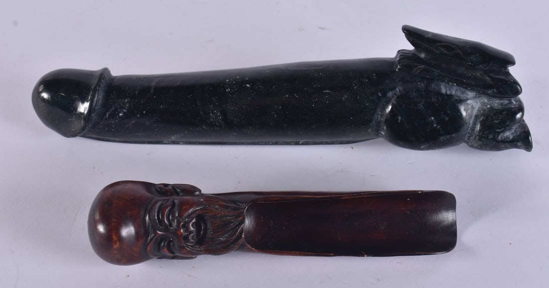 A CHINESE CARVED STONE PHALLUS together with a sage wood scope. Largest 23 cm long. (2) (1 of 4)