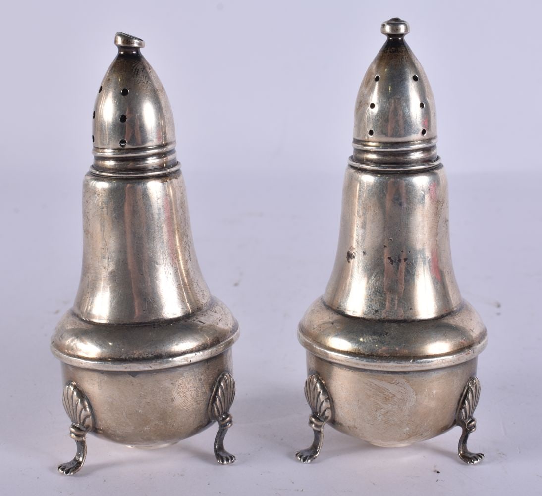 A PAIR OF SILVER CONDIMENTS. 268 grams overall. 11.5 cm high. (1 of 4)