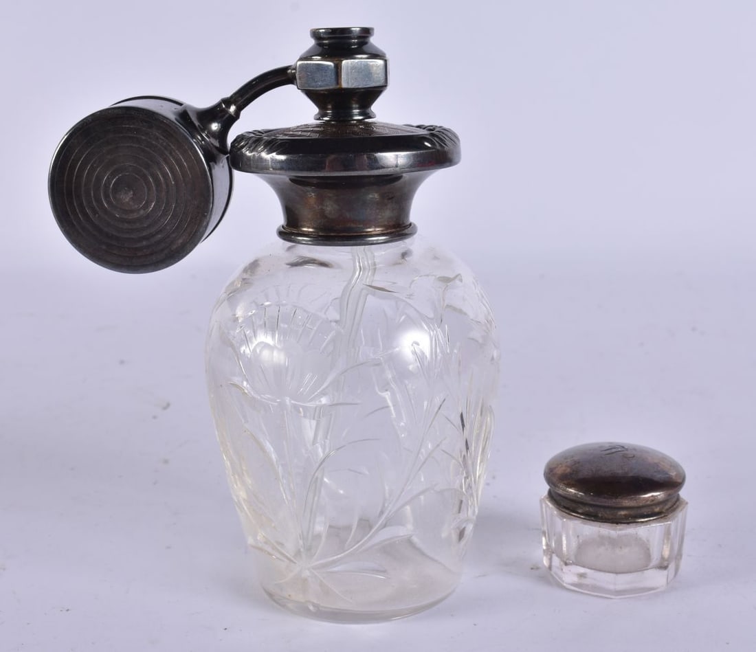A SILVER MOUNTED GLASS JAR together with an unusual atomiser. Largest 11 cm high. (2) (1 of 5)