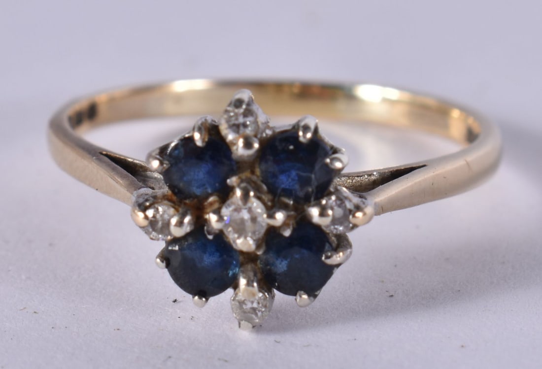 A 9CT GOLD DIAMOND AND SAPPHIRE RING. Q 1/2. 2.2 grams. (1 of 4)