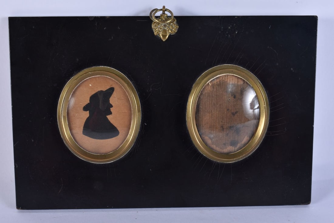 A GEORGE III MINIATURE FRAME containing silhouette. 23 cm x 15 cm. (1 of 2)