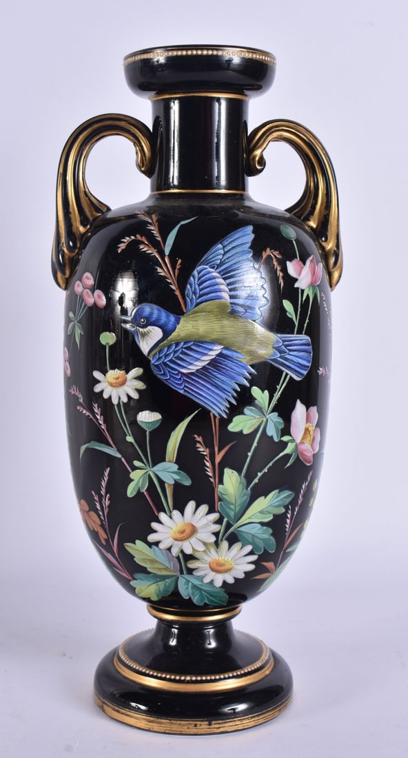 A VICTORIAN BLACK OPALINE TWIN HANDLED GLASS VASE. 29 cm high.: A VICTORIAN BLACK OPALINE TWIN HANDLED GLASS VASE. 29 cm high.