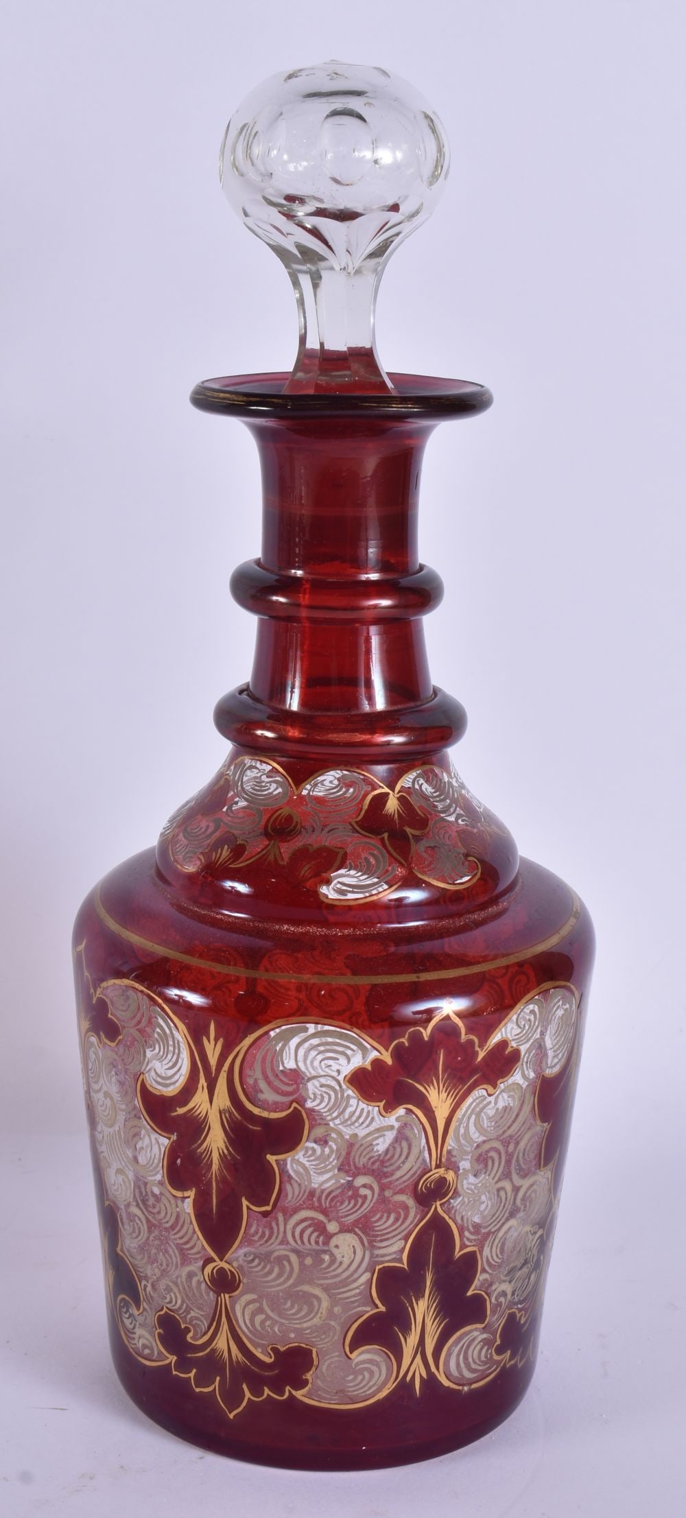 A BOHEMIAN RUBY GLASS DECANTER. 31 cm high. (1 of 4)