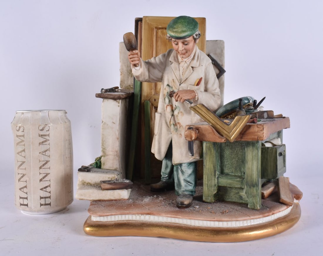 A CAPO DI MONTE CERAMIC FIGURE OF THE CARPENTER. 27 cm x 18 cm. (1 of 6)