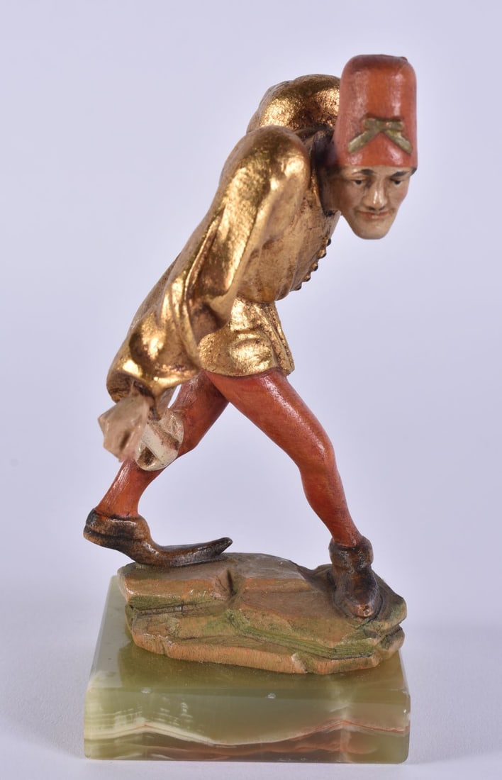 A LOVELY AND UNUSUAL EARLY 20TH CENTURY PAINTED WOOD FIGURE OF A MALE upon an onyx base. 14 cm high.: A LOVELY AND UNUSUAL EARLY 20TH CENTURY PAINTED WOOD FIGURE OF A MALE upon an onyx base. 14 cm high.