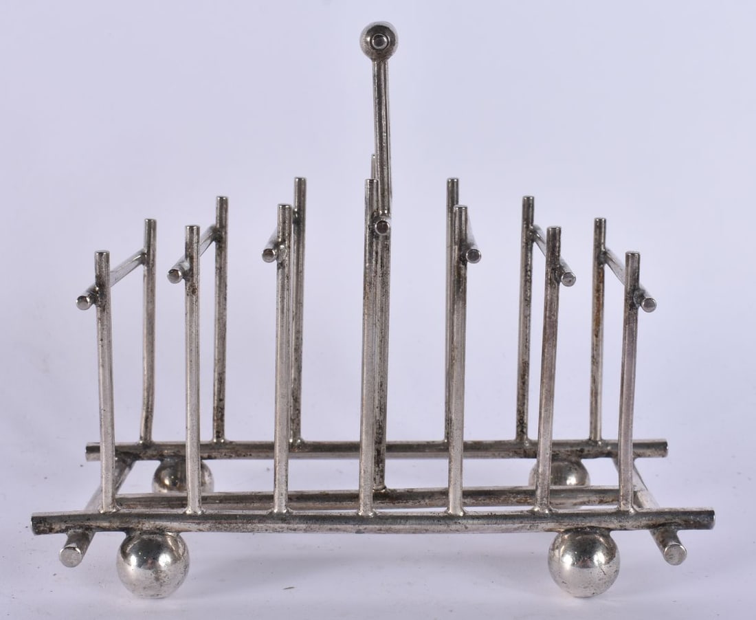 A DRESSER STYLE SILVER PLATED TOAST RACK. 18 cm x 15 cm. (1 of 5)