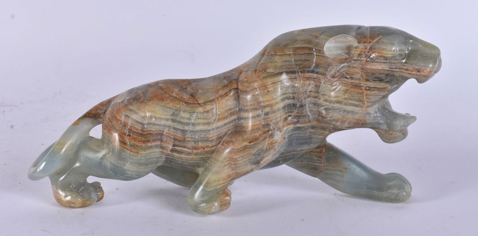A CONTINENTAL STONE TIGER. 18 cm wide. (1 of 5)