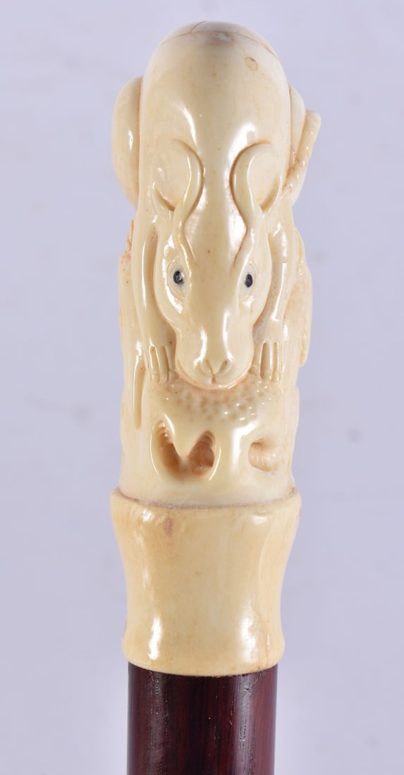 A NOVELTY BONE WALKING CANE. 90 cm long. (1 of 4)