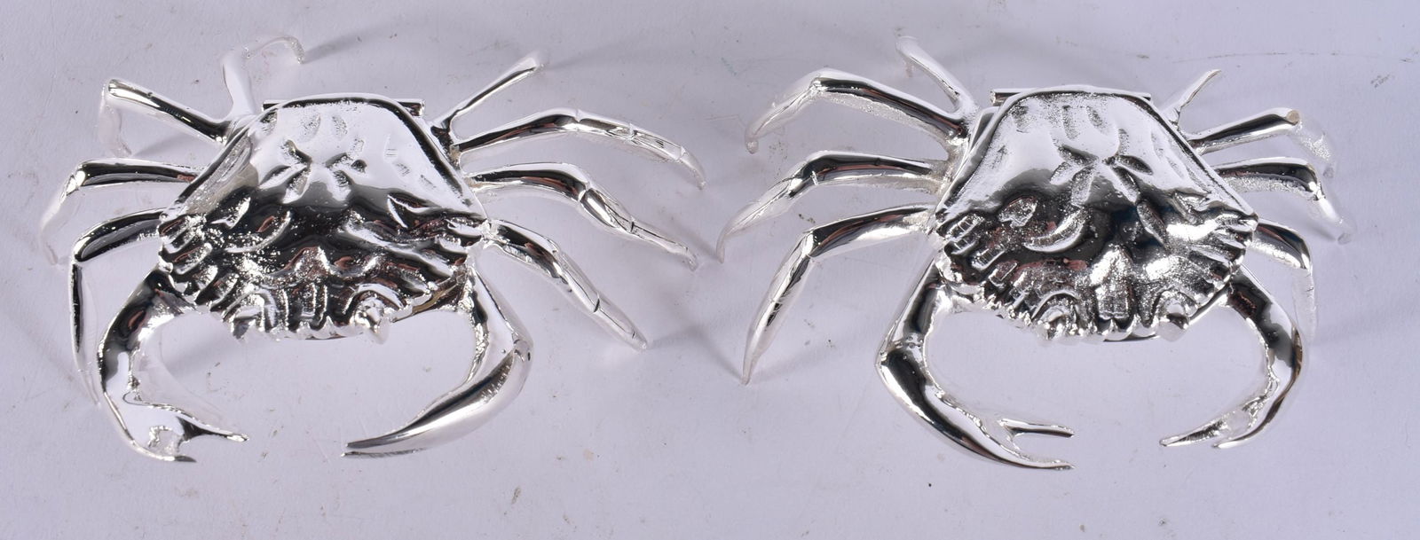 A PAIR OF SILVER PLATED CRAB BOXES. 11 cm wide.: A PAIR OF SILVER PLATED CRAB BOXES. 11 cm wide.
