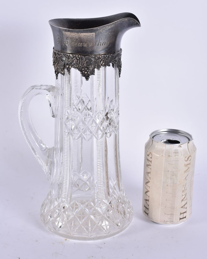 A LARGE SILVER MOUNTED CUT GLASS JUG. 28 cm high. (1 of 5)