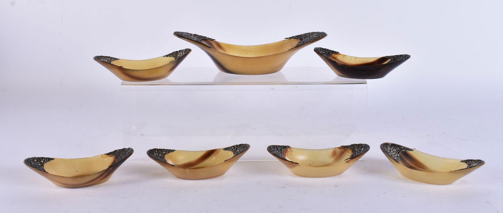 A SET OF 19TH CENTURY INDIAN SILVER MOUNTED HORN BOWLS. Largest 18 cm wide. (7) (1 of 4)