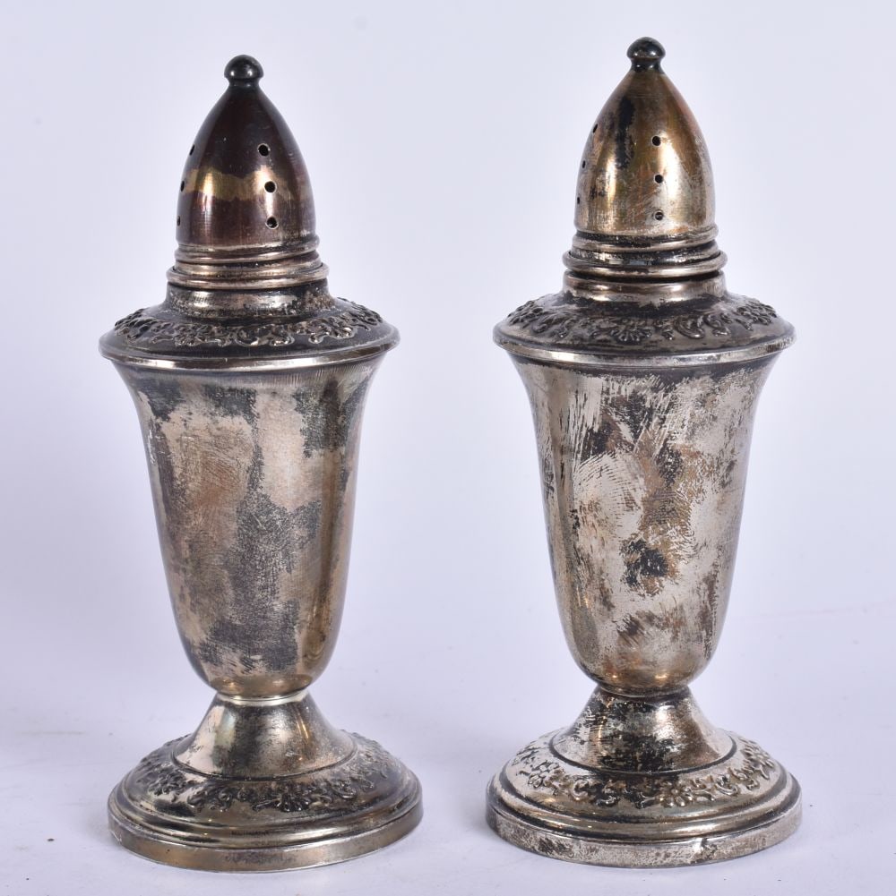 A PAIR OF SILVER CONDIMENTS. 200 grams. 12 cm high. (1 of 5)