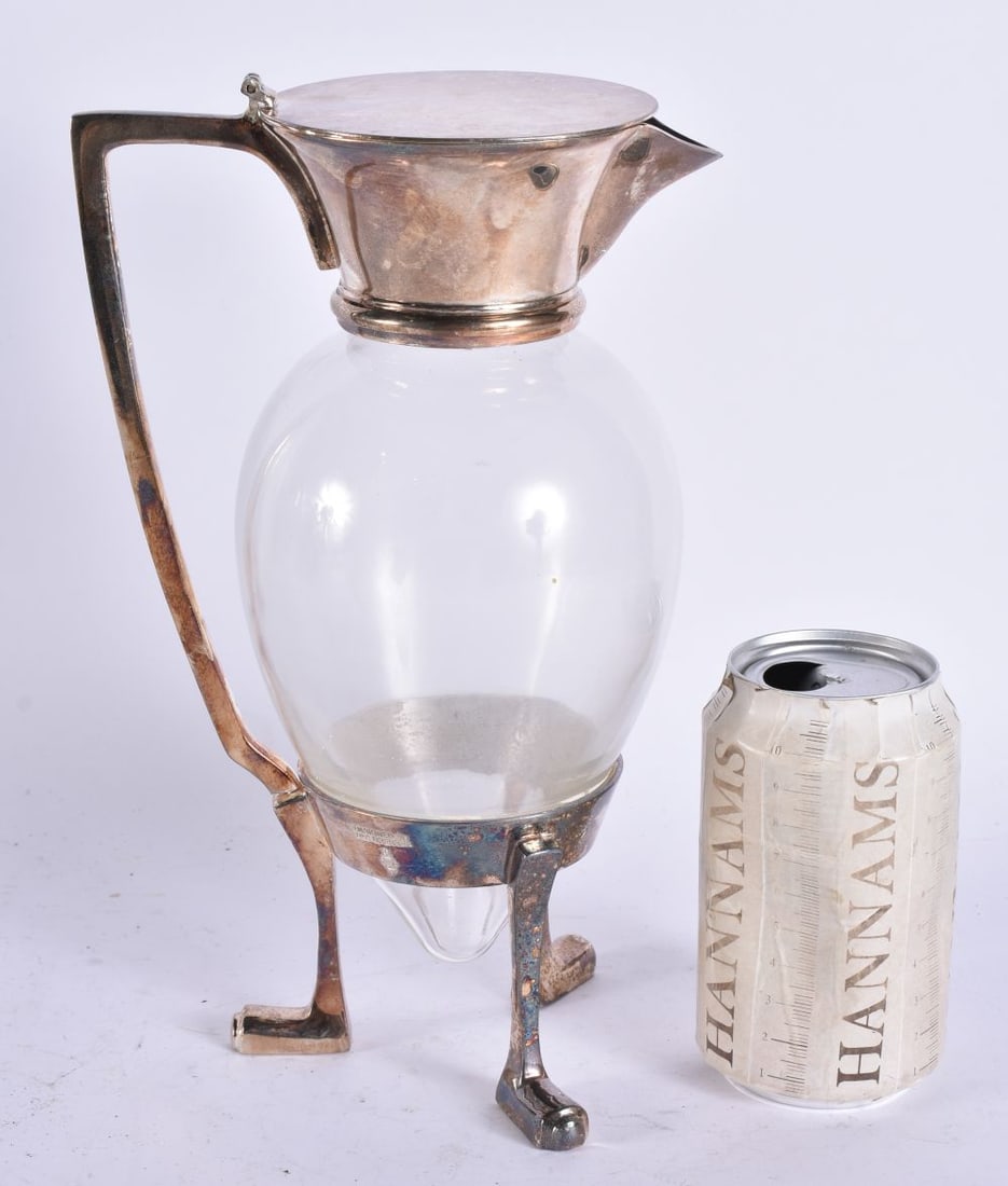 A SILVER PLATED DRESSER STYLE CLARET JUG. 27 cm high. (1 of 6)