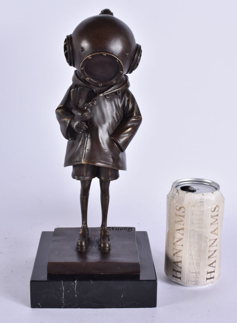 A BRONZE DIVER SCULPTURE. 31 cm high. (1 of 5)