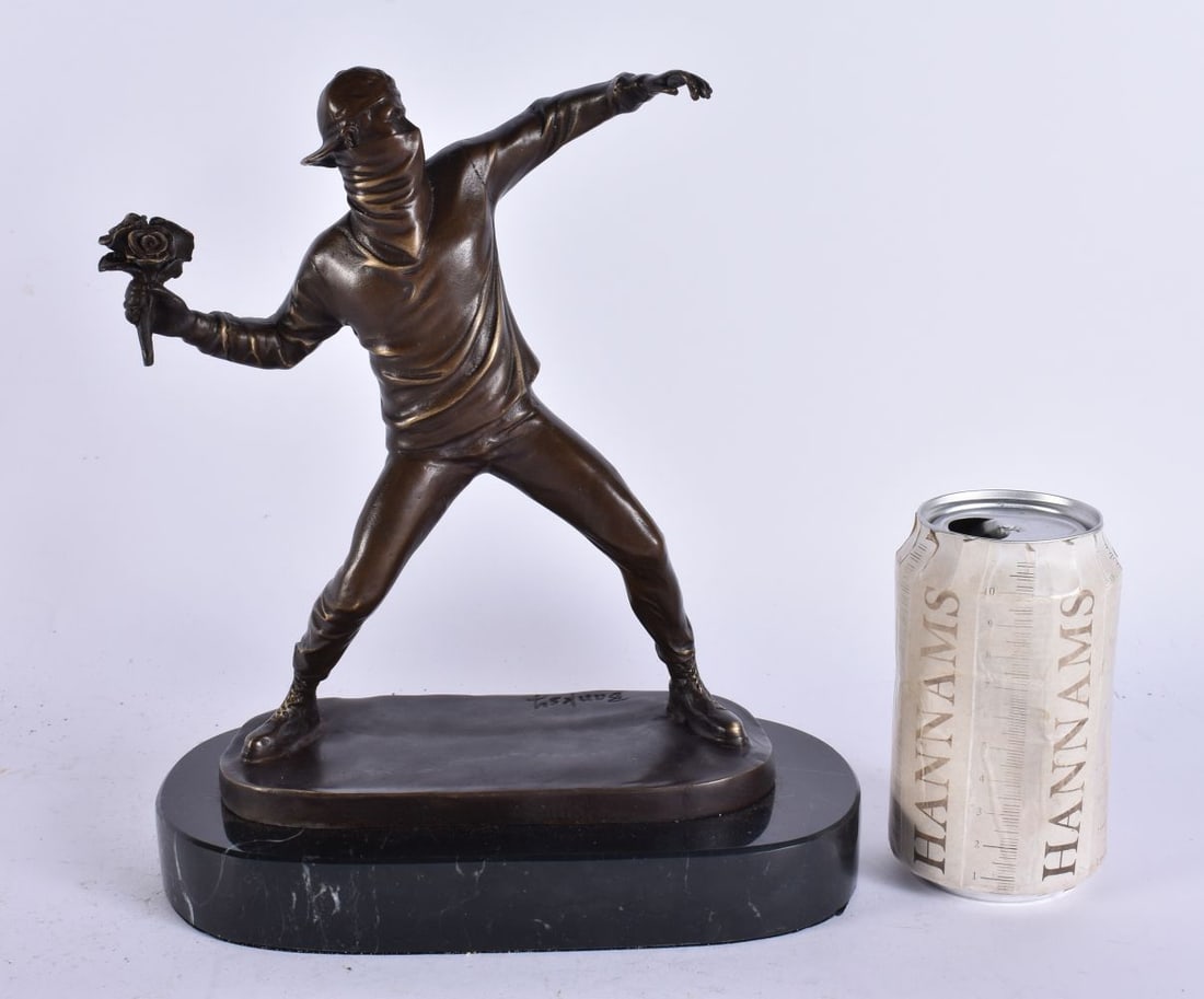 A BRONZE ROSE THROWER SCULPTURE. 27 cm high.: A BRONZE ROSE THROWER SCULPTURE. 27 cm high.