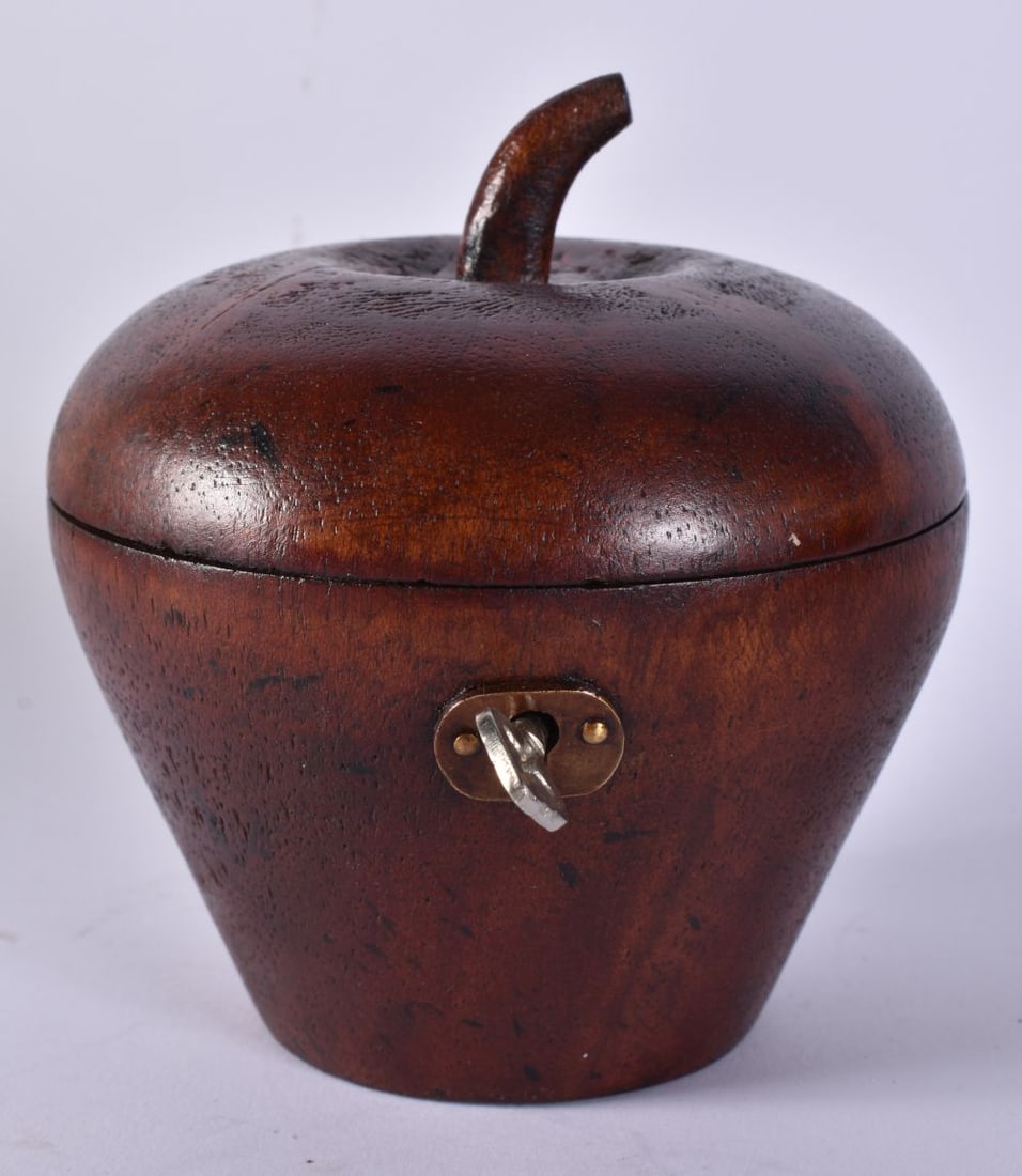 A TREEN WOOD FRUIT TEA CADDY. 11 cm high. (1 of 5)