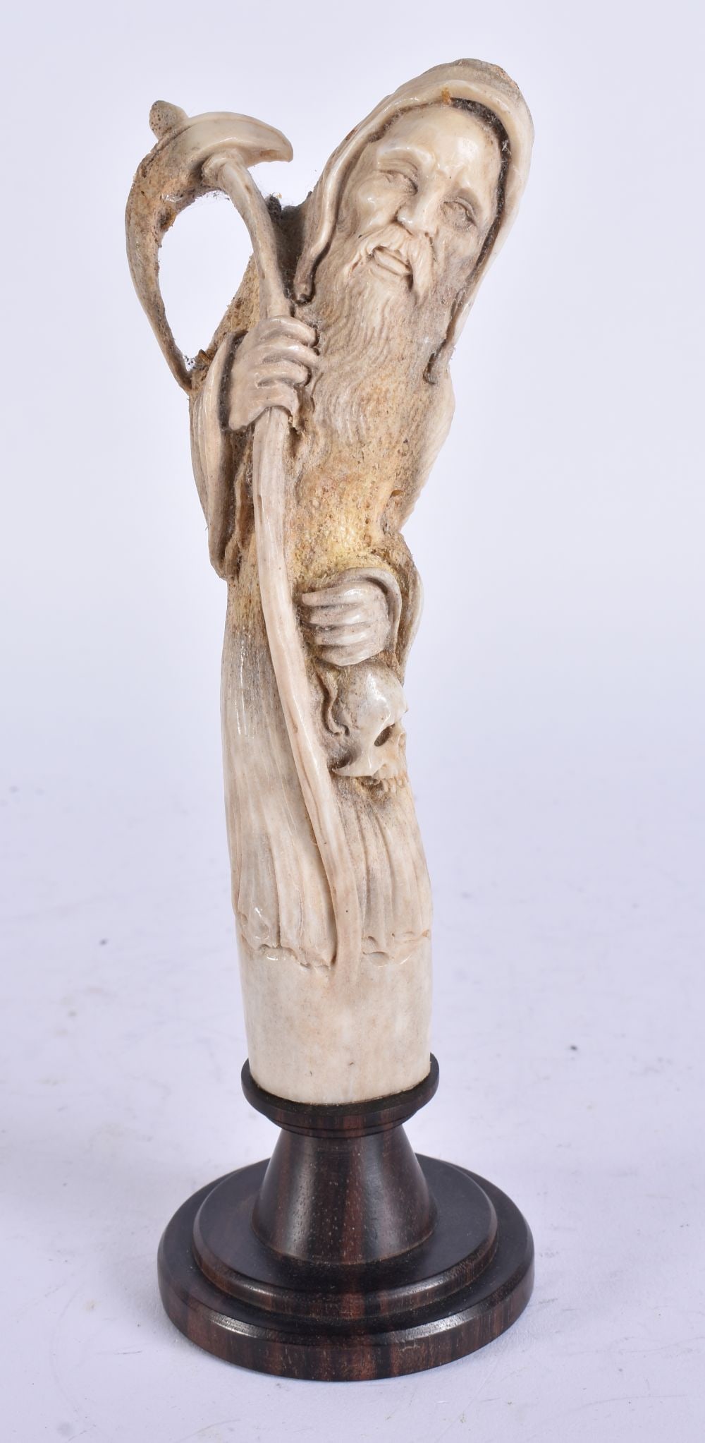 A CARVED STAG ANTLER FIGURE OF A BEARDED WIZARD. 19 cm high. (1 of 5)