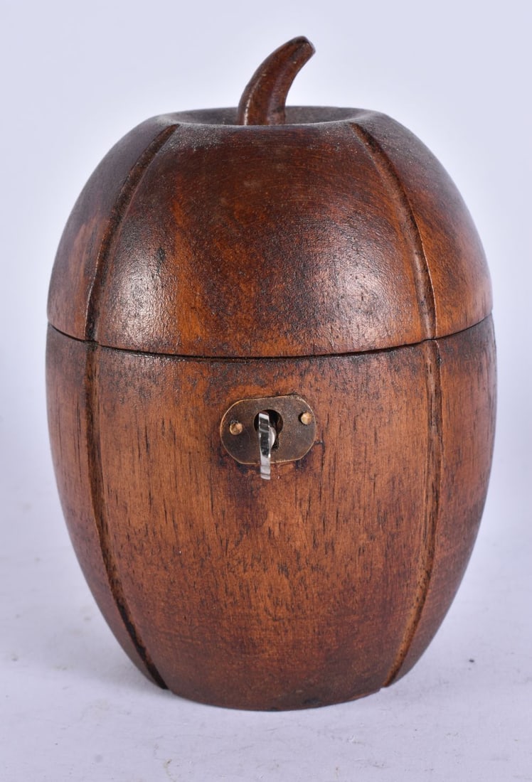 A TREEN WOOD FRUIT TEA CADDY. 11 cm high. (1 of 5)