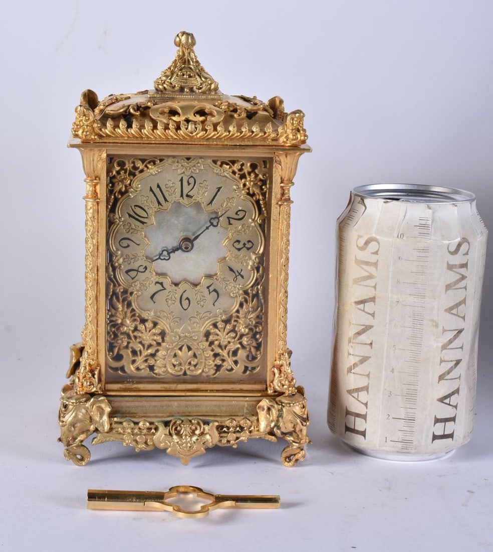 A BRONZE RETICULATED CARRIAGE CLOCK. 19 cm high. (1 of 8)