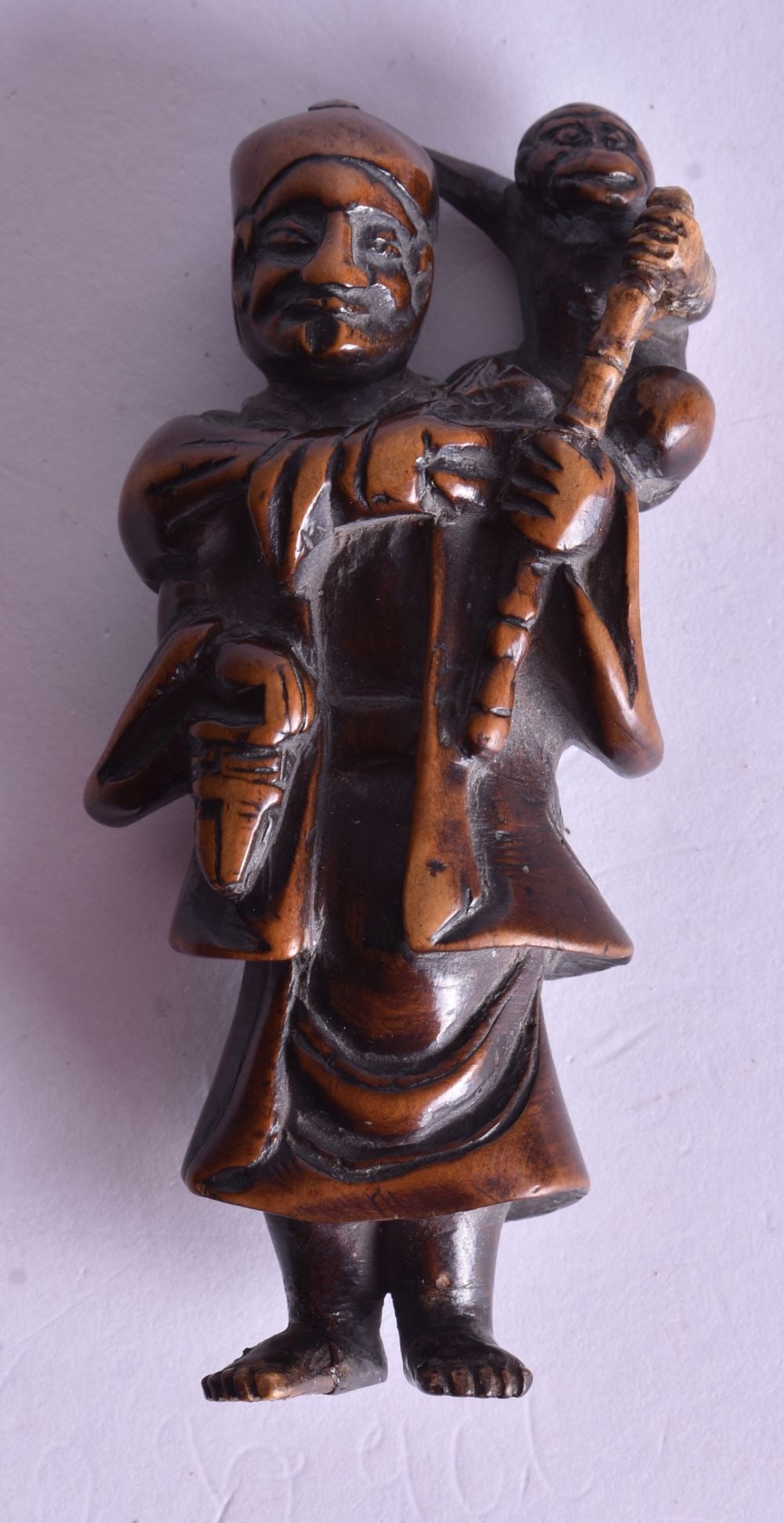 A 19TH CENTURY JAPANESE MEIJI PERIOD CARVED BOXWOOD NETSUKE. 9 cm high. (1 of 3)