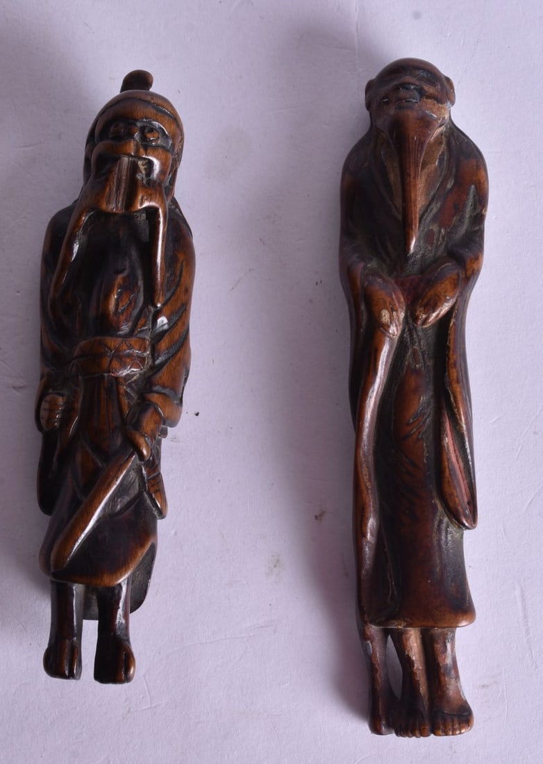 TWO 19TH CENTURY JAPANESE MEIJI PERIOD CARVED BOXWOOD NETSUKES. Largest 11.5 cm high. (2) (1 of 3)