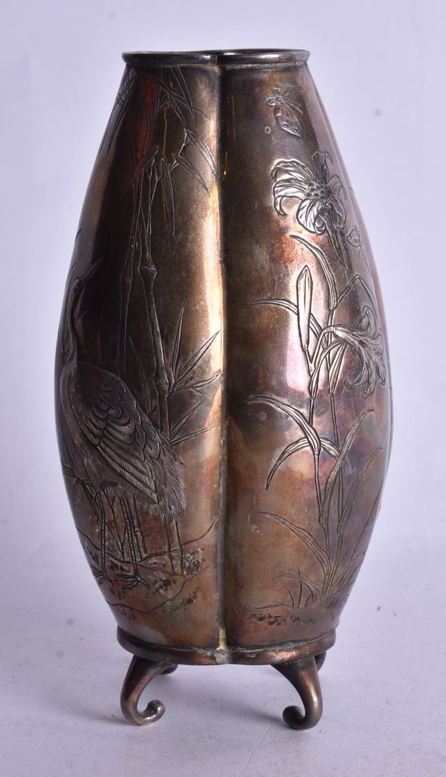 A 19TH CENTURY JAPANESE MEIJI PERIOD WHITE METAL VASE decorated with birds. 18 cm high. (1 of 4)