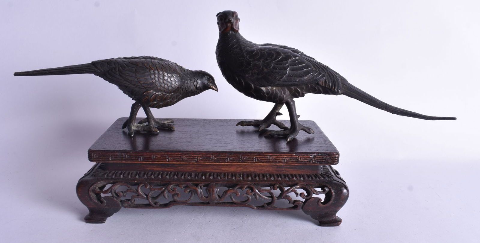 A 19TH CENTURY JAPANESE MEIJI PERIOD METAL OKIMONO modelled as two game birds. 21 cm wide. (1 of 6)