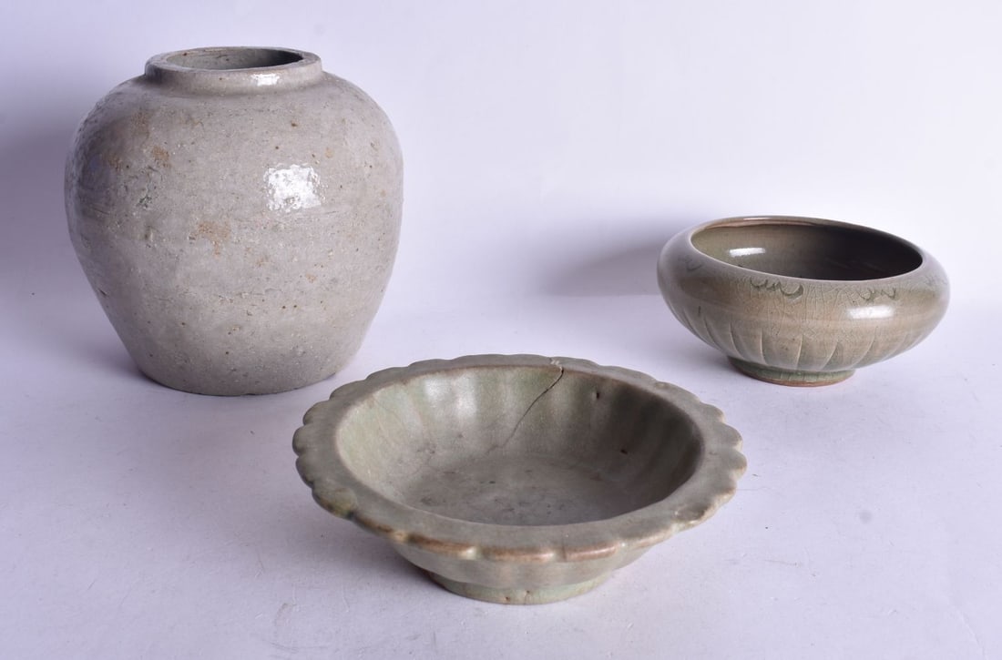 AN EARLY CHINESE CELADON DISH etc. Largest 12 cm wide. (3) (1 of 7)