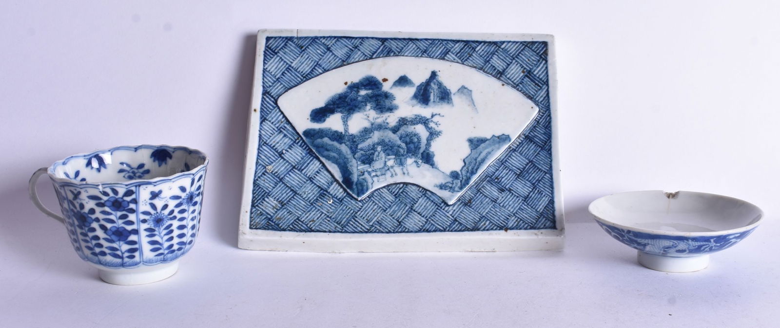 A 19TH CENTURY ORIENTAL BLUE AND WHITE FAN PORCELAIN PLAQUE etc. Largest 19 cm wide. (3) (1 of 5)