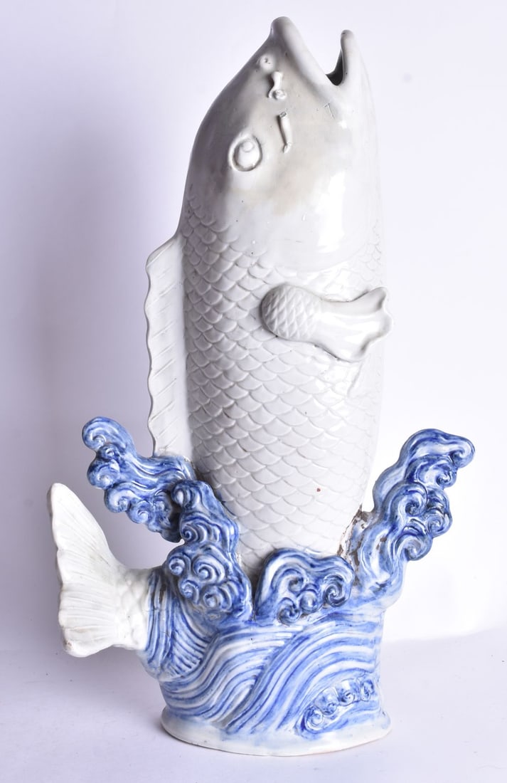 A LARGE AND UNUSUAL 18TH/19TH CENTURY JAPANESE EDO PERIOD PORCELAIN CARP. 42 cm high. (1 of 5)