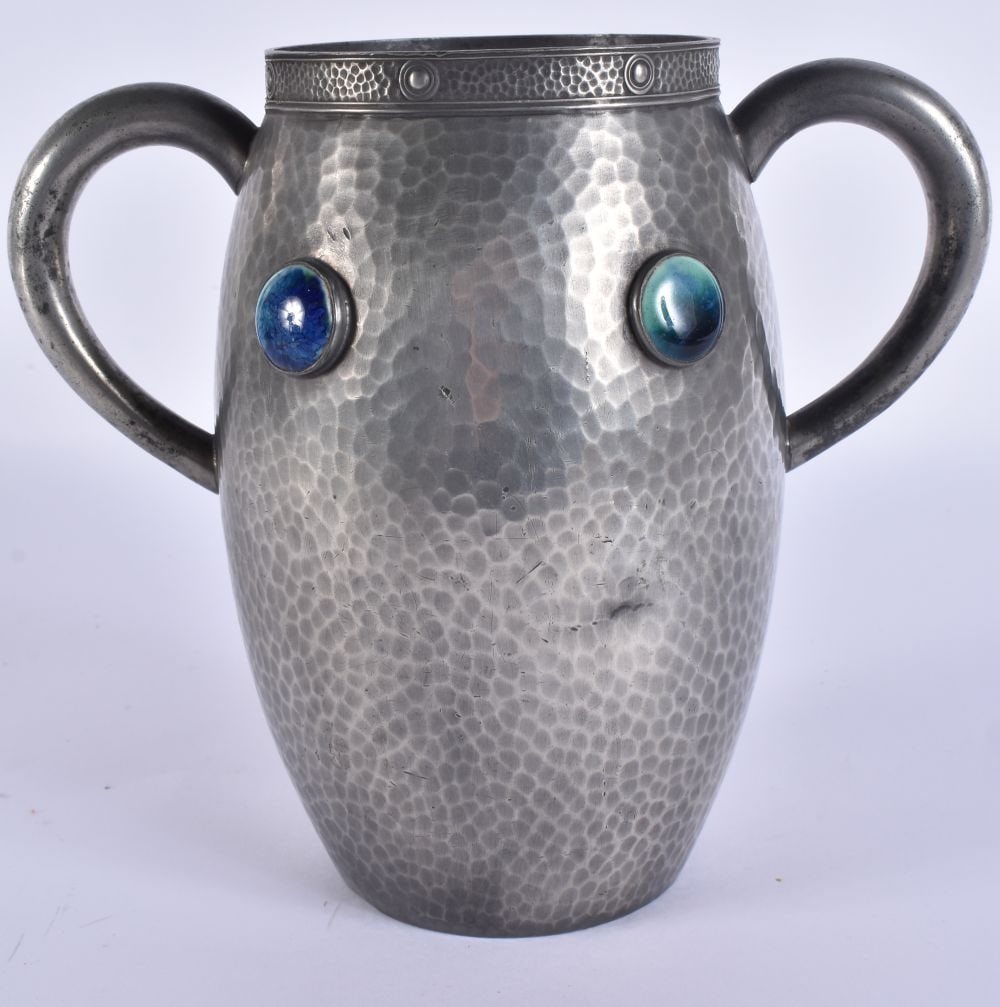 AN ART DECO TWIN HANDLED LIBERTY STYLE PEWTER AND RUSKIN POTTERY VASE. 17 cm high. (1 of 5)