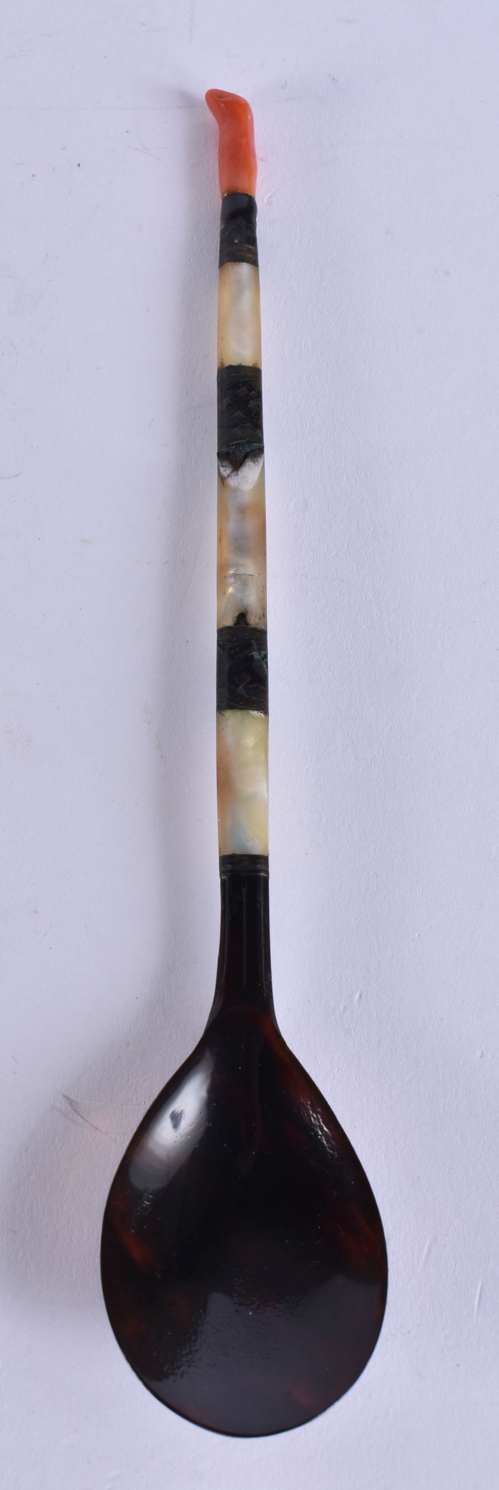 AN ANTIQUE TURKISH OTTOMAN CORAL SHERBERT SPOON. 18 cm long.: AN ANTIQUE TURKISH OTTOMAN CORAL SHERBERT SPOON. 18 cm long.